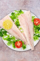 Tasty fresh fish vegetable salad in plate