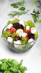 Tasty fresh fish vegetable salad in plate