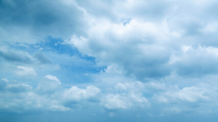 Blue sky covering with white cumulus