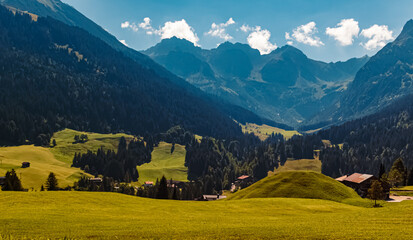 Fototapeta na wymiar Beautiful alpine summer view at the famous Kleinwalsertal valley, Mittelberg, Vorarlberg, Austria