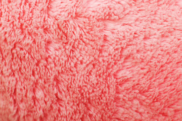 pink fluffy textile texture. Nappy hairy background closeup.