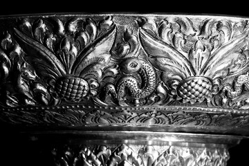 Silverware bowl traditional northern Thailand handmade on black background