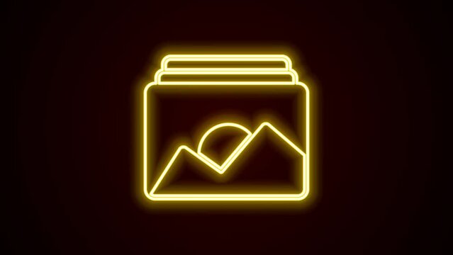 Glowing neon line Photo frame icon isolated on black background. Vintage empty photos frame. 4K Video motion graphic animation