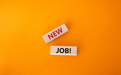 New job symbol. Wooden blocks with words New job. Beautiful orange background. Business and New job concept. Copy space.