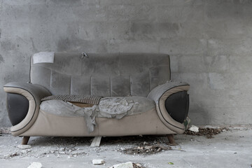badly damaged sofa with copy space