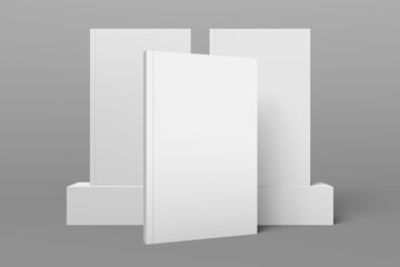 3 book models standing upright on a gray background. 3d realistic render soft cover book mockup. Mockup of book with white cover on isolated background.