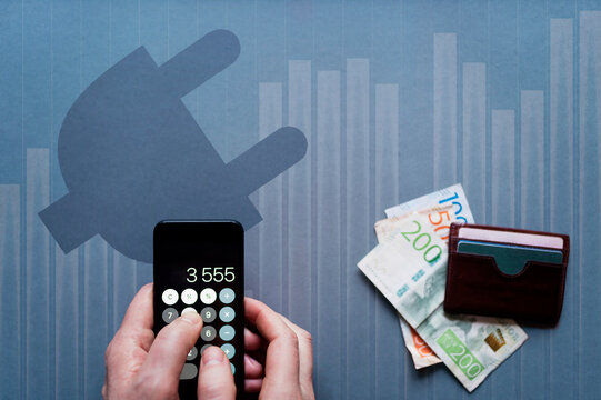 Hand holding calculator