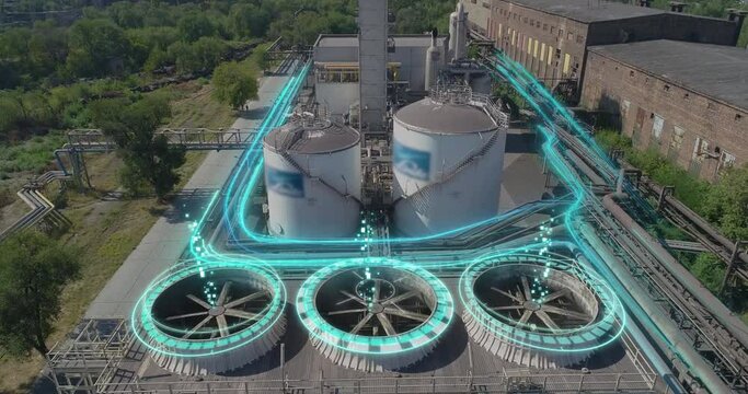 Industrial cooling towers with futuristic graphics. A futuristic shot of a factory exterior. Cooling tower from a drone. Wet cooling towers. Evaporative cooling towers