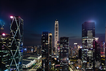 Fototapeta na wymiar Modern office buildings in the city at night