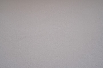 textured empty gray cement wall blur or blurry