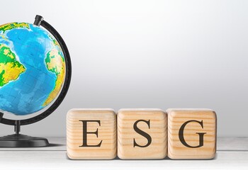 ESG Concept on cubes and studing globe