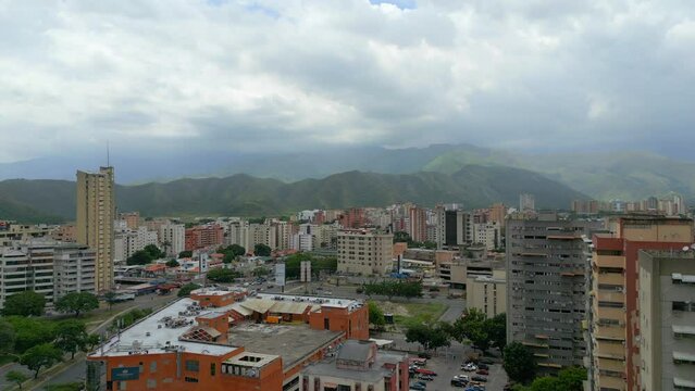 Maracay city aerial view, Venezuela, Aragua. The Caribbean town is surrounded by mountains