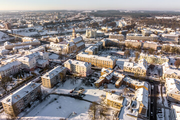Fototapeta premium winter panoramic aerial view of a huge residential complex with high-rise buildings with snow