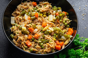 rice noodle vegetable mix green beans, carrots, bean, tonga beans, green peas veggie vegan food vegetarian asian food snack meal on the table copy space food background rustic top view