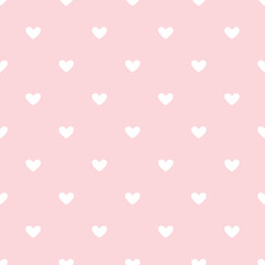 Vector valentines day seamless pattern with white hearts on pink background