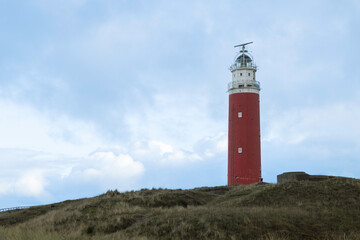 Fototapeta na wymiar the lighthouse of the island texel in holland