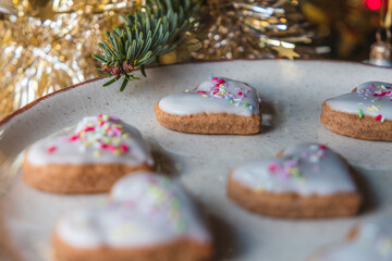 Christmas biscuits with a Christmas tree and snowman. White iced Christmas cookies in different sizes and shapes