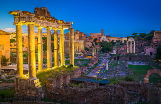 Roman Forum - ancient ruins in Rome illuminated at night, Italy