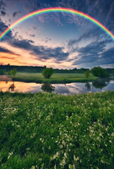 Fototapeta na wymiar Landscape with a Rainbow on the River in Spring. colorful morning. nature of Ukraine