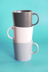 ceramic coffee cup on blue background, drink mug