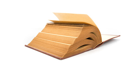 Open thick vintage book on a white