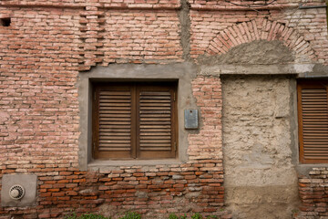 old brick wall with window