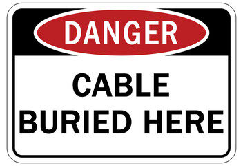 Buried cable warning sign and labels cable buried here