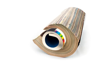 Rolled up magazines on a white background