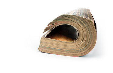 Rolled up magazines on a white background
