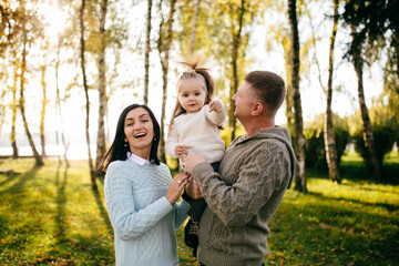 Family in green nature together