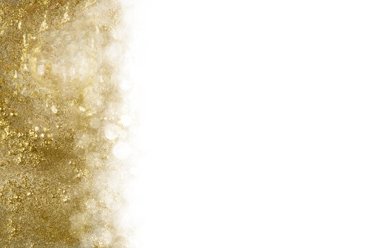 Golden glitter abstract background with sparkling bokeh