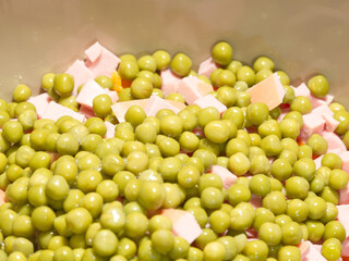 The Olivier salad is already sliced. Closeup