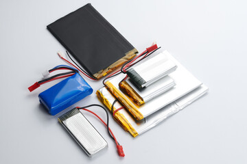 Different types of lithium battery isolated on white background