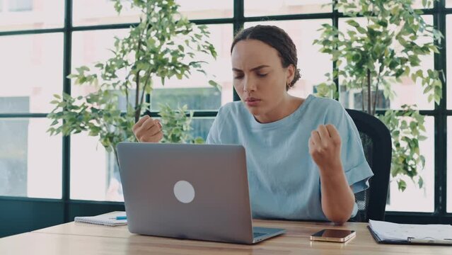 Annoyed Angry Young Brazilian Or Latino Business Lady, Company Director, Supervisor, Annoyed Looks At Laptop Screen, Sits In Office, Gesturing With Hands, Irritated By Poor Performance Of Employees