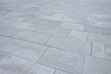New paving made with stone blocks of rectangular shape in a pedestrian zone