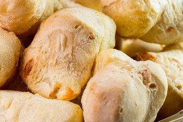 Brazilian Pão de queijo, fresh cheese breads. Selective focus