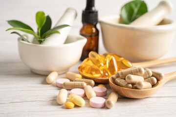 Alternative medicine herbal organic capsule drug with herbs leaf natural supplements for healthy...