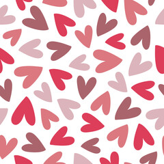 Abstract seamless pattern with pink and purple hearts on white background. Hand drawn doodle style