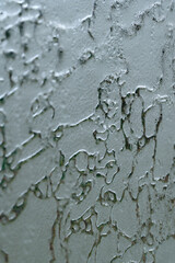 Textured glass with a pattern, tinted glass for baths and showers.