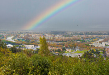 Rome (Italy) - The Tiber river and the monumental Lungotevere street in the metropolitan capital of Italy. Here in particular the view from Monte Mario with rainbow.