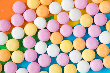 Candy on the colorful background, high angle view
