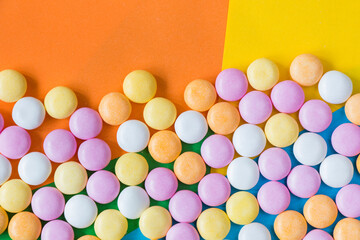 Candy on the colorful background, high angle view
