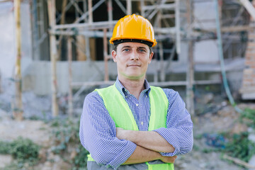 Portrait Engineer builder. Happy Foreman confident arm crossed project worker architect leader man