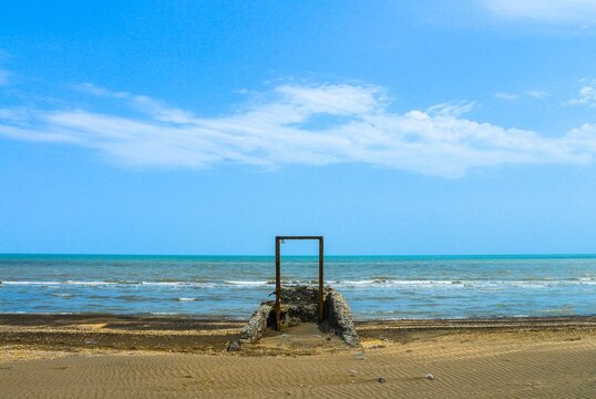 concrete door on the beach