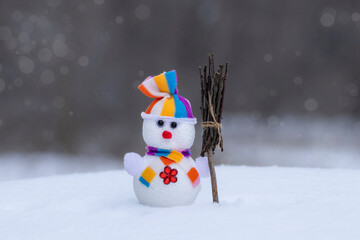 Christmas Snowman.A greeting holiday card with a funny snowman with a broom on a winter Christmas...