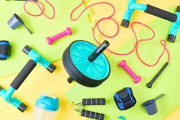 Fitness equipment on colorful mats.
