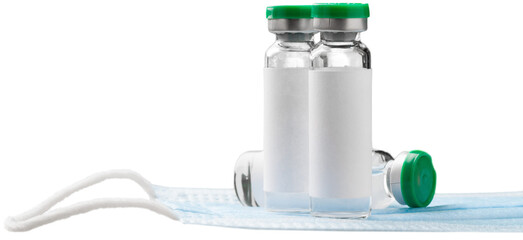 Covid-19 vaccine bottle with a blue liquid and taking the vaccine from it with a syringe