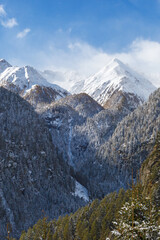 Snow capped mountain peaks in the alps