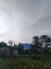 time clouds over the mountains