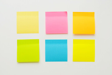 Six multi-colored blank note paper on a white background
